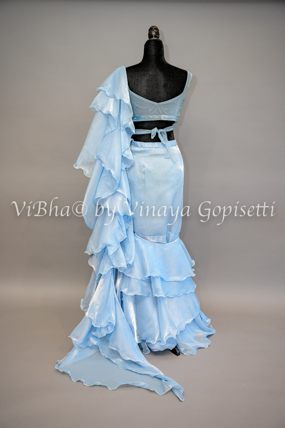 Sky Blue Ruffled Pre Pleated Saree And Embroidered Blouse