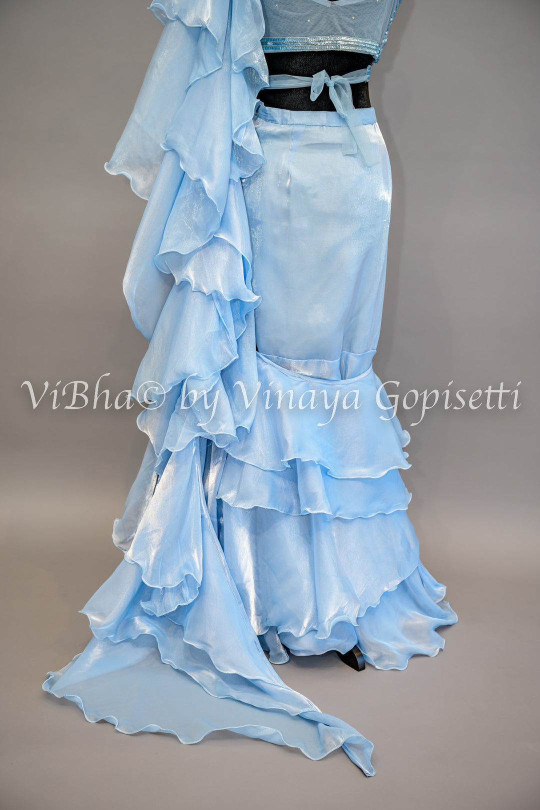 Sky Blue Ruffled Pre Pleated Saree And Embroidered Blouse