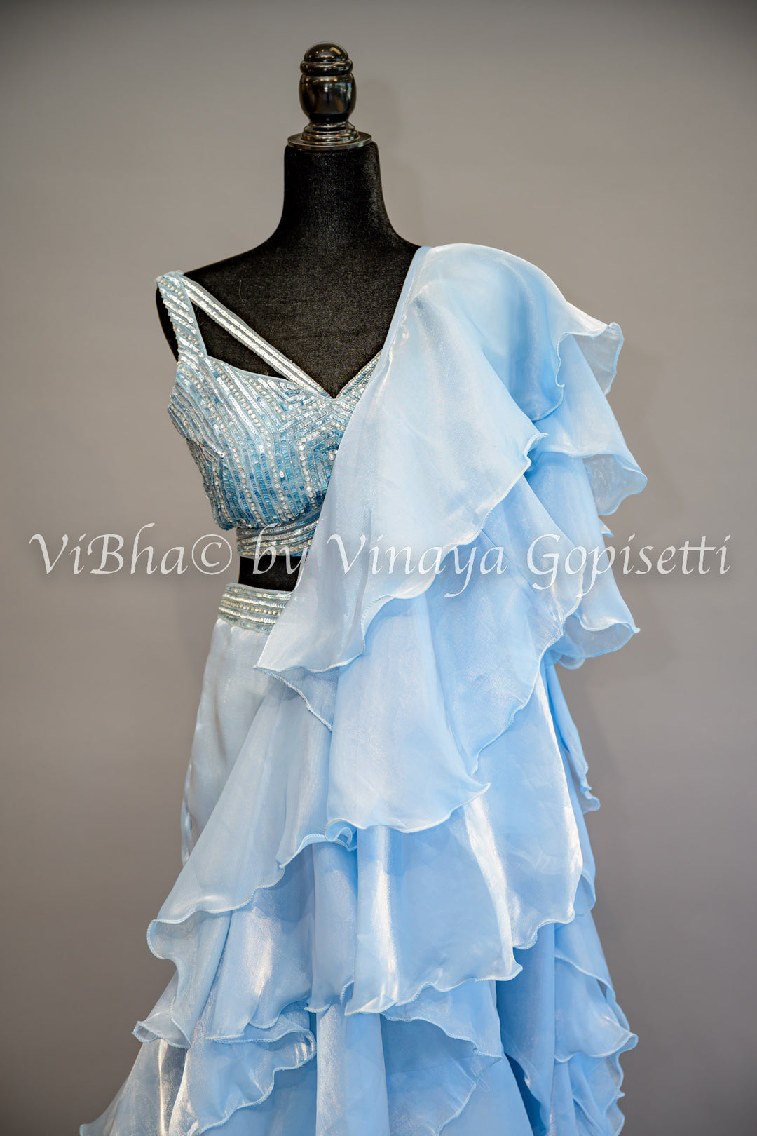 Sky Blue Ruffled Pre Pleated Saree And Embroidered Blouse