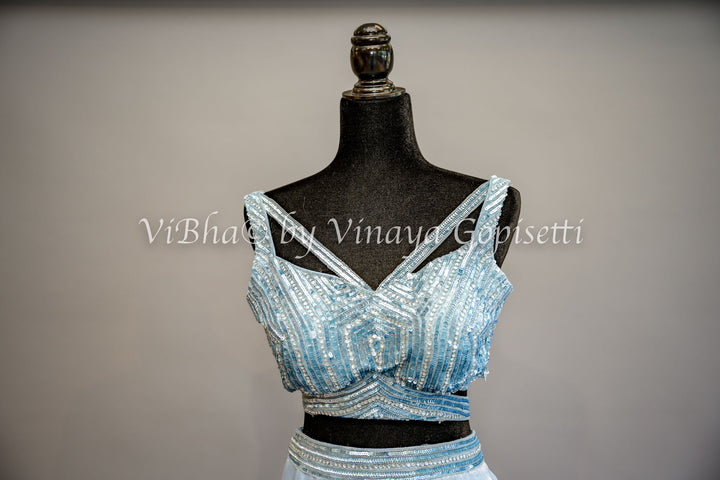 Sky Blue Ruffled Pre Pleated Saree And Embroidered Blouse