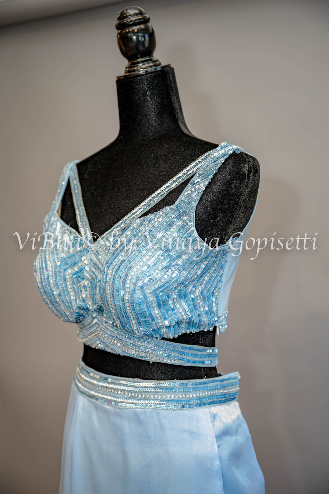 Sky Blue Ruffled Pre Pleated Saree And Embroidered Blouse