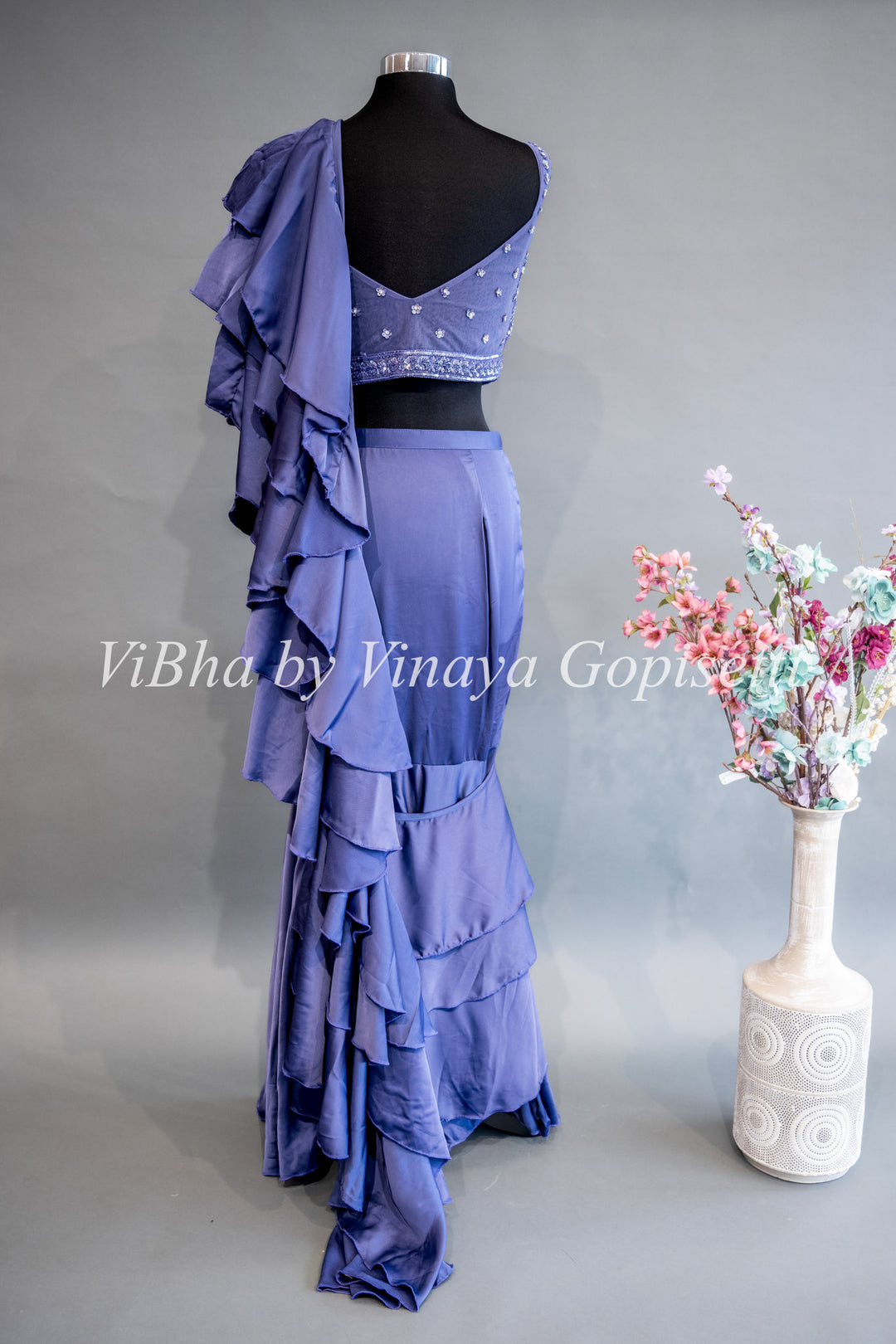 Ultra Violet Pre Plated Saree with Ruffles And Embroidered Blouse