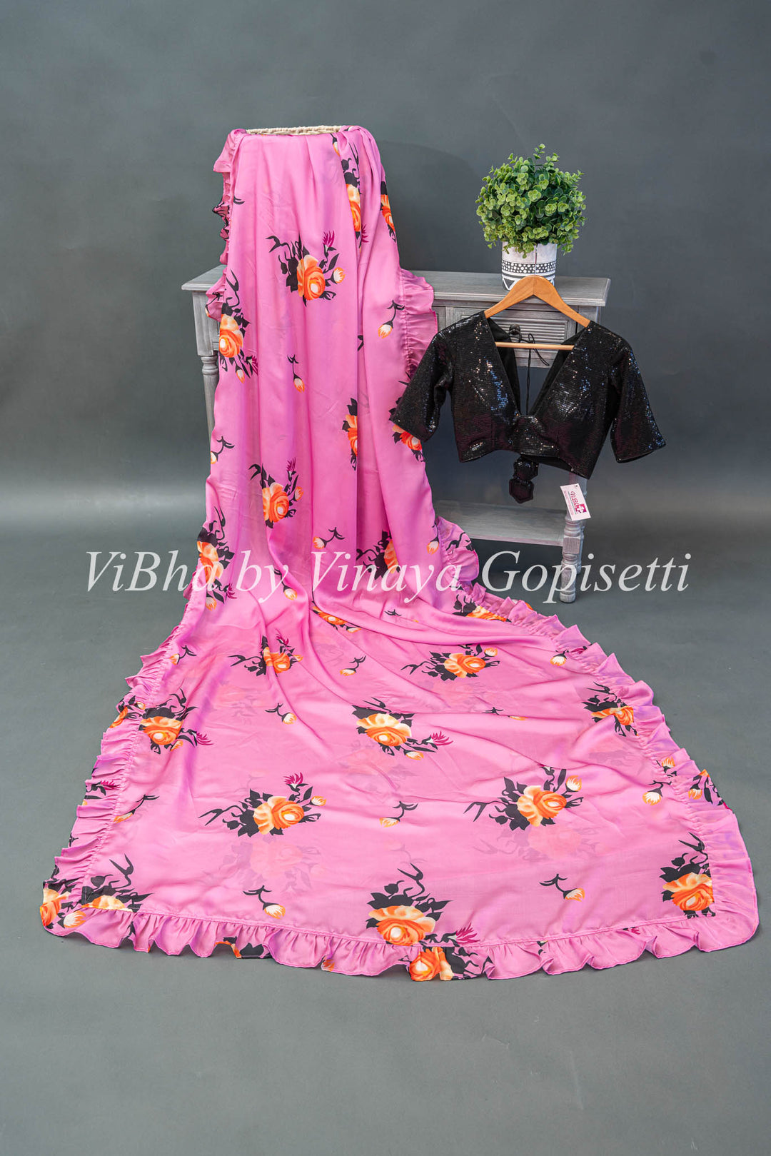 Light Purple Floral Saree With Ruffle Borders And Contrast White Blouse