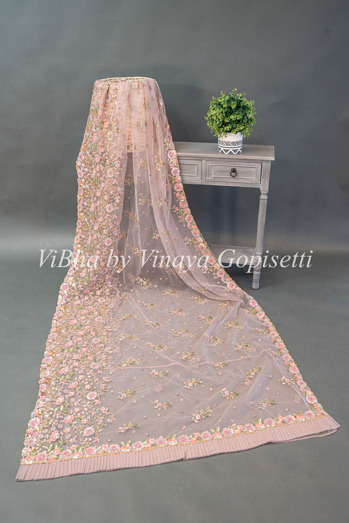 Pastel Mauve Net Floral Embroidered Saree And Blouse