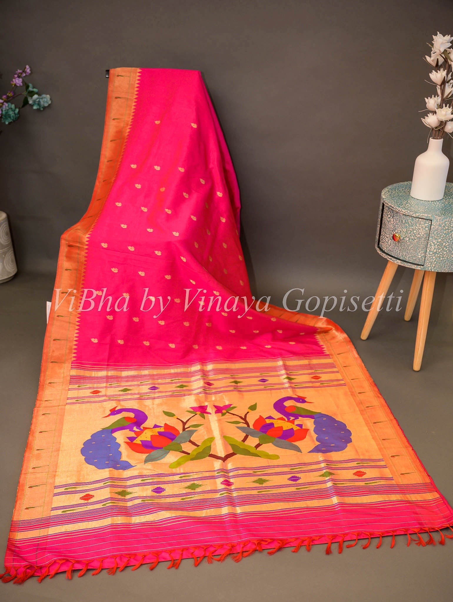 Rani pink color paithani silk saree with meenakari work