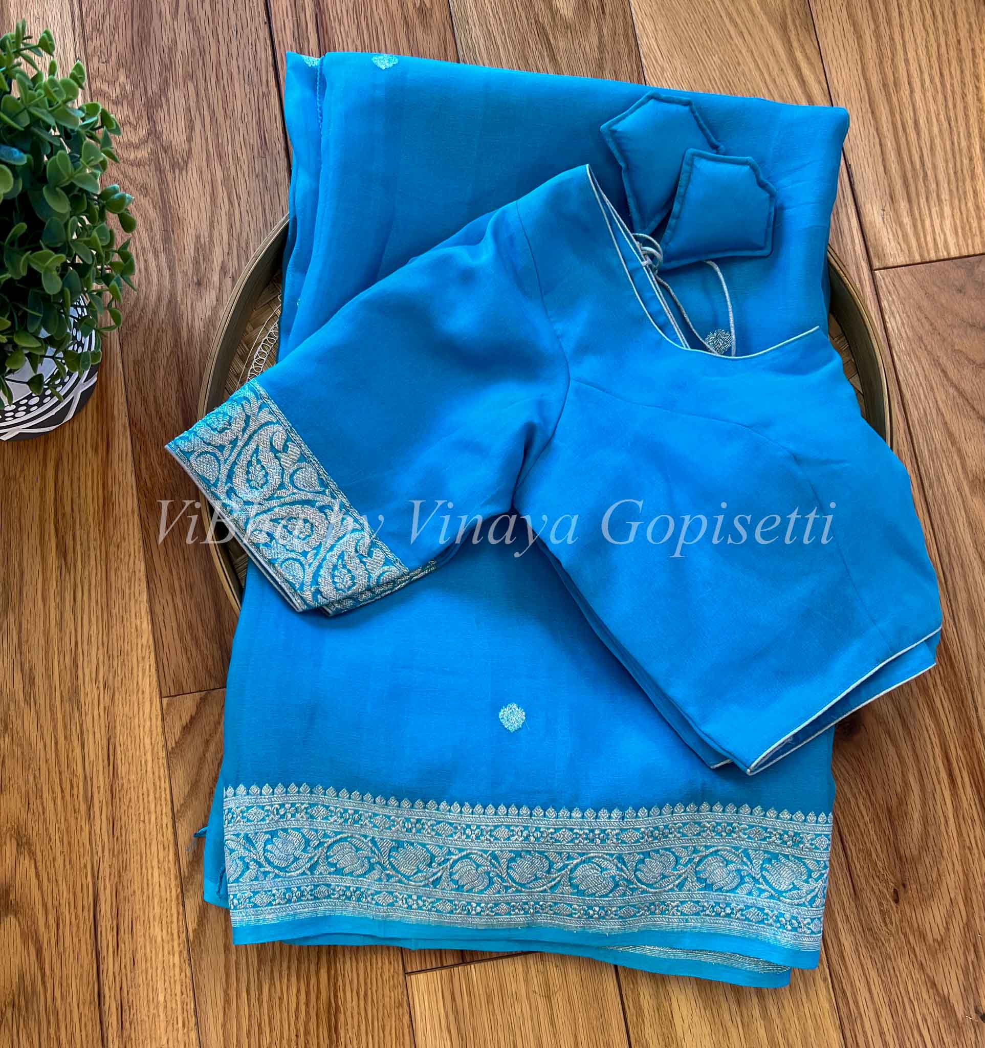 Sky blue color linen silk saree with woven design